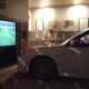 Illustration for article titled Subaru Fan-Boys Drive Impreza Into Living Room To Watch TV Up-Close